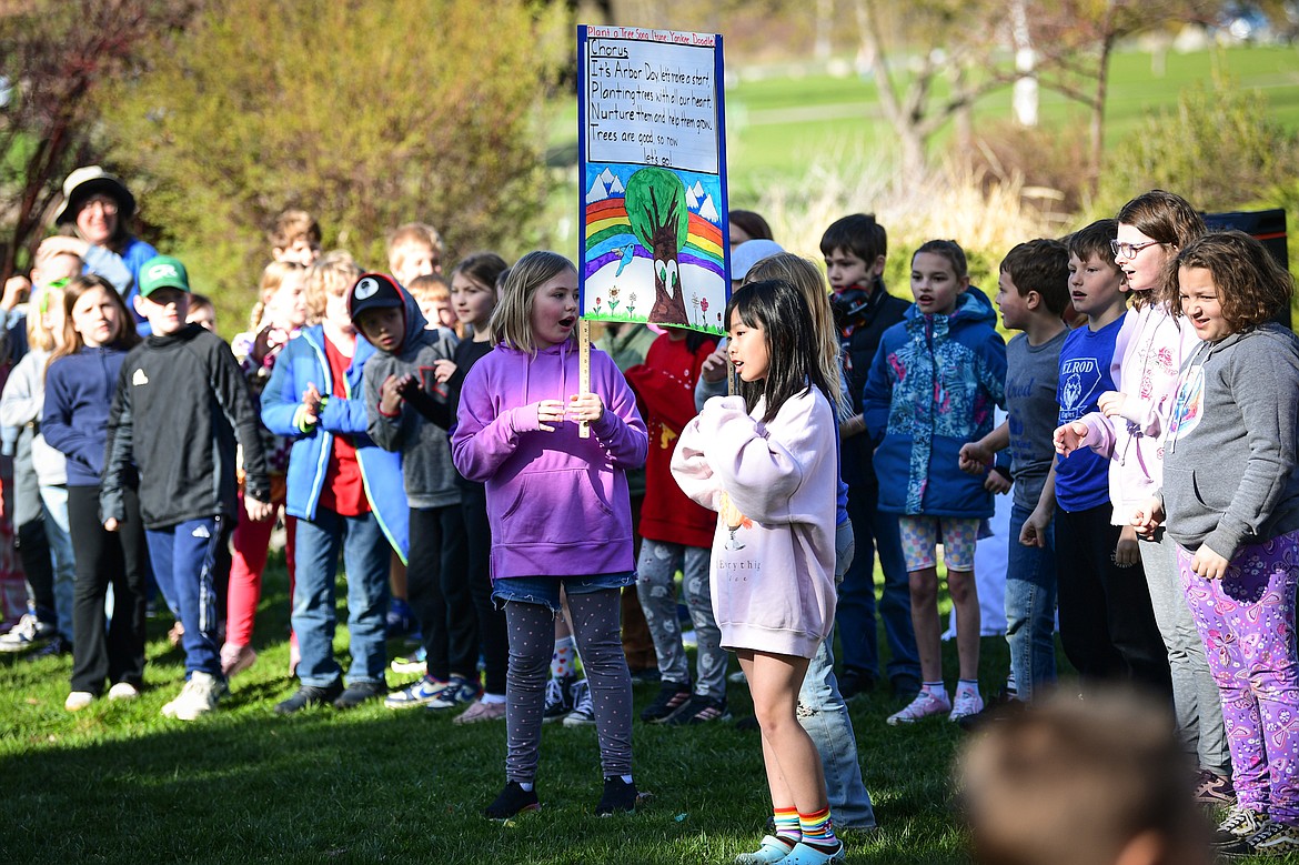 Elrod Elementary third-graders sing a song about Arbor Day at the Arbor Day celebration at Lawrence Park on Friday, April 25. (Casey Kreider/Daily Inter Lake)