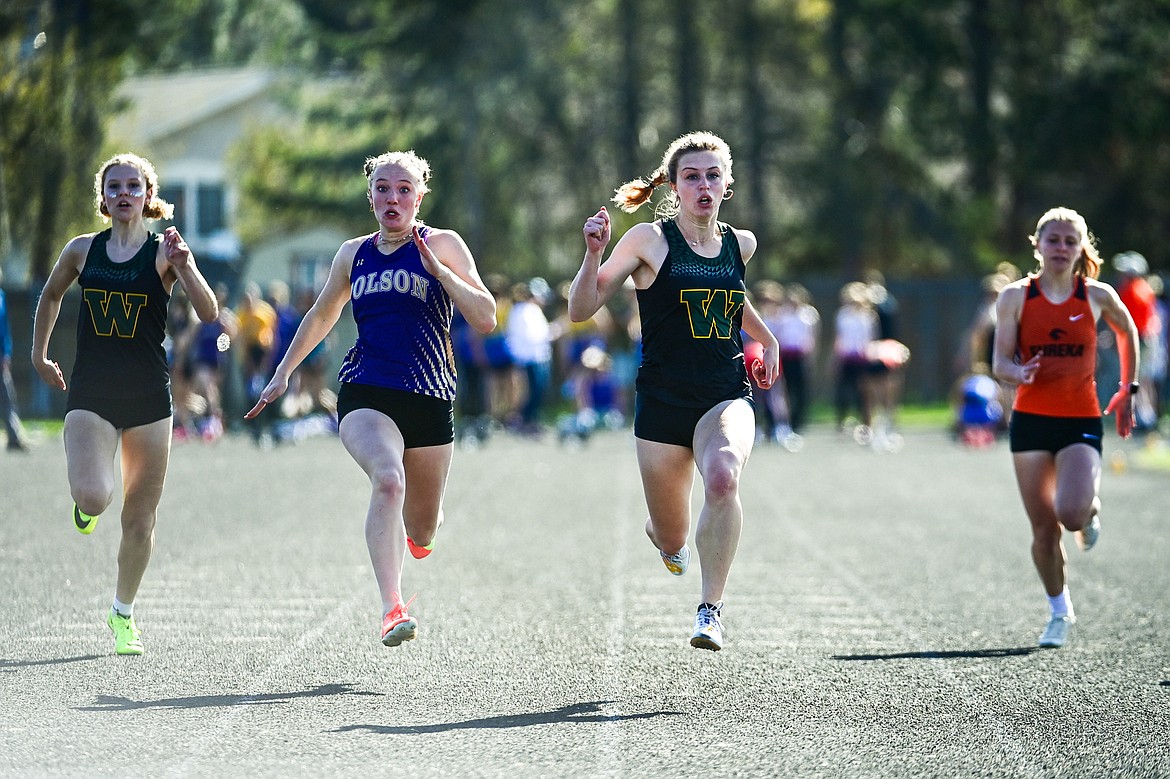 Whitefish's Rachael Wilmot wins the girls' 100 meter dash at the Whitefish ARM Invitational on Saturday, April 26. (Casey Kreider/Daily Inter Lake)