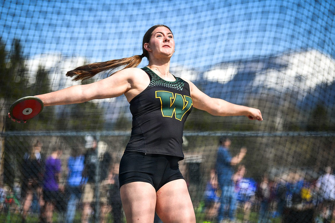 Whitefish's Sol Holmquist releases a throw in the girls' discus at the Whitefish ARM Invitational on Saturday, April 26. (Casey Kreider/Daily Inter Lake)