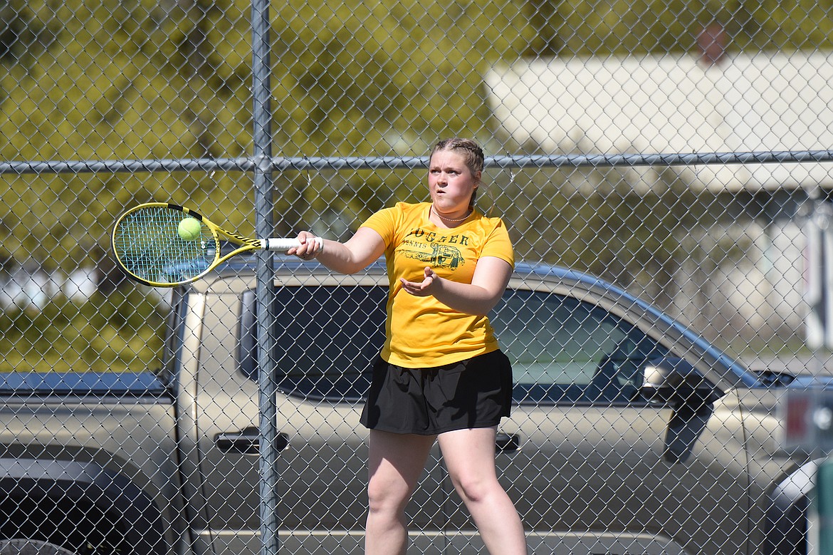 Libby's Aubrey Davis returns a shot during a doubles match with teammate Bella Meyer Friday, April 25, 2025, at the Libby Invitational. (Scott Shindledecker/The Western News)