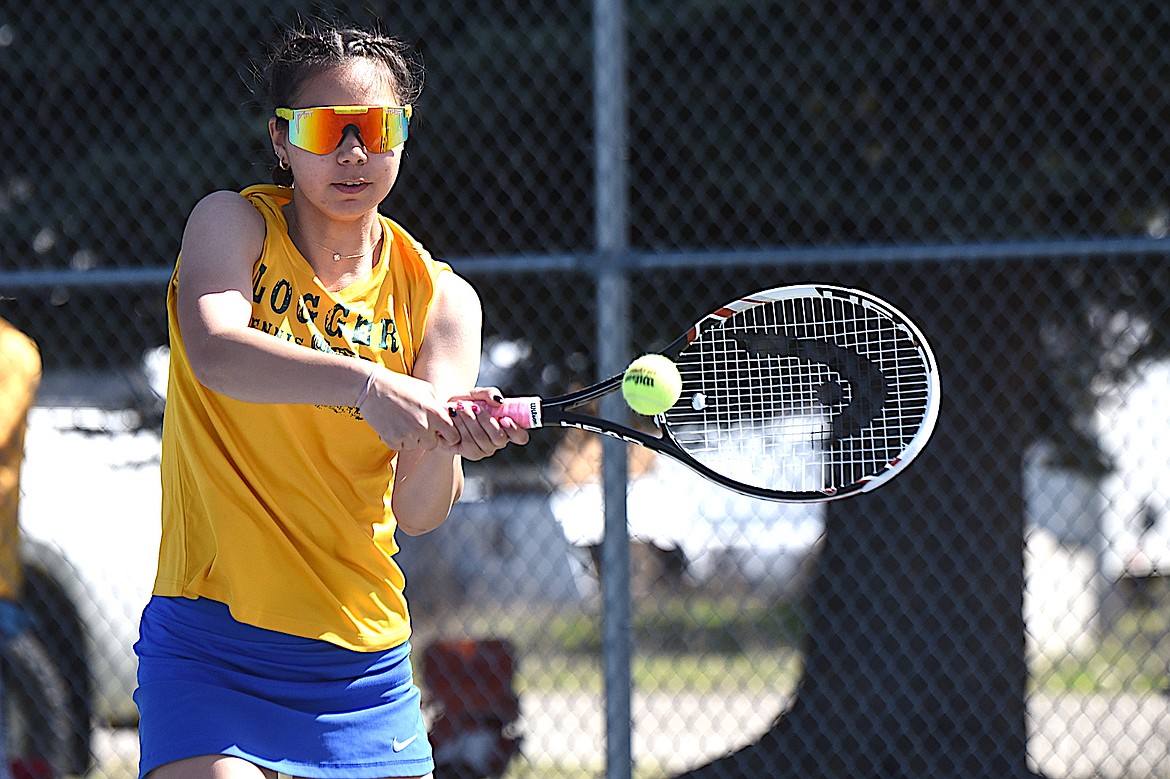 Libby's Augie Bailey returns a shot during a doubles match with teammate Shya Huck Friday, April 25, 2025, at the Libby Invitational. (Scott Shindledecker/The Western News)