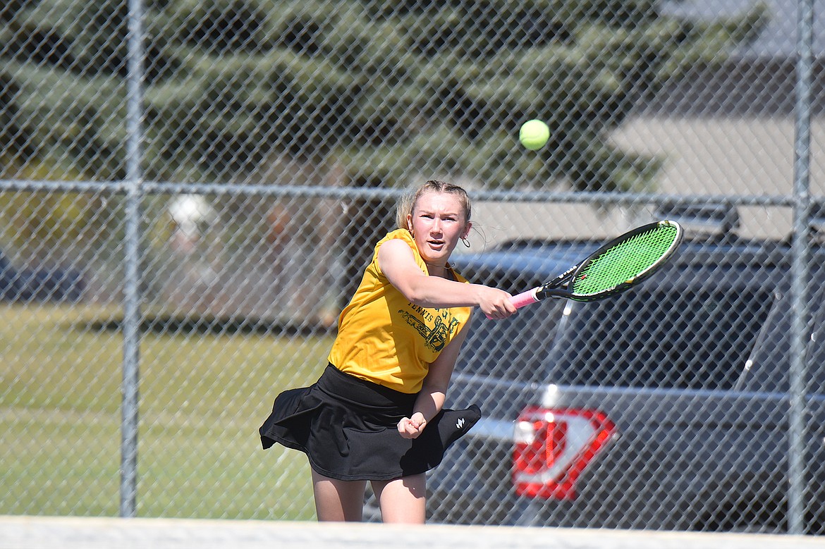 Libby's Bella Meyer returns a shot during a doubles match with teammate Aubrey Davis Friday, April 25, 2025, at the Libby Invitational. (Scott Shindledecker/The Western News)