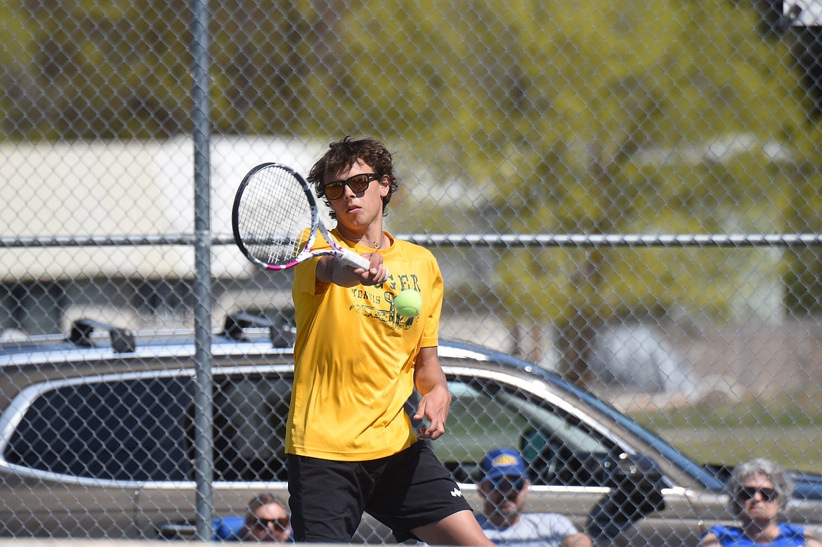 Libby's Blaise Erickson returns a shot Saturday, April 26, 2025, during a doubles match with teammate Isaac Lamere at the Libby Invitational. (Scott Shindledecker)