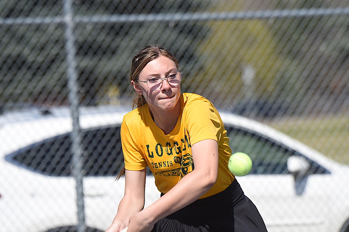Libby's Shya Huck returns a shot during a doubles match with teammate Augie Bailey Friday, April 25, 2025, at the Libby Invitational. (Scott Shindledecker/The Western News)