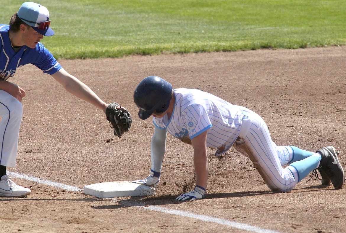 Libby Loggers Bransen Holzer slides into third base with a 2-run triple in the bottom of the first inning against Fort Macleod Saturday, April 26, 2025, at Lee Gehring Field. (Paul Sievers/The Western News)