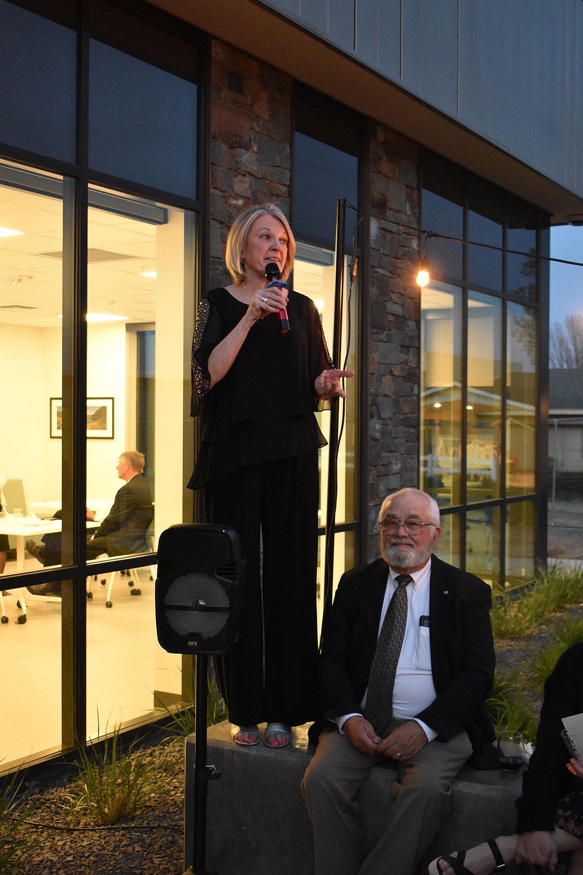 Quincy Valley Medical Center Administrator Glenda Bishop addresses attendees at First Look, a preview of QVMC’s new hospital, Friday night.