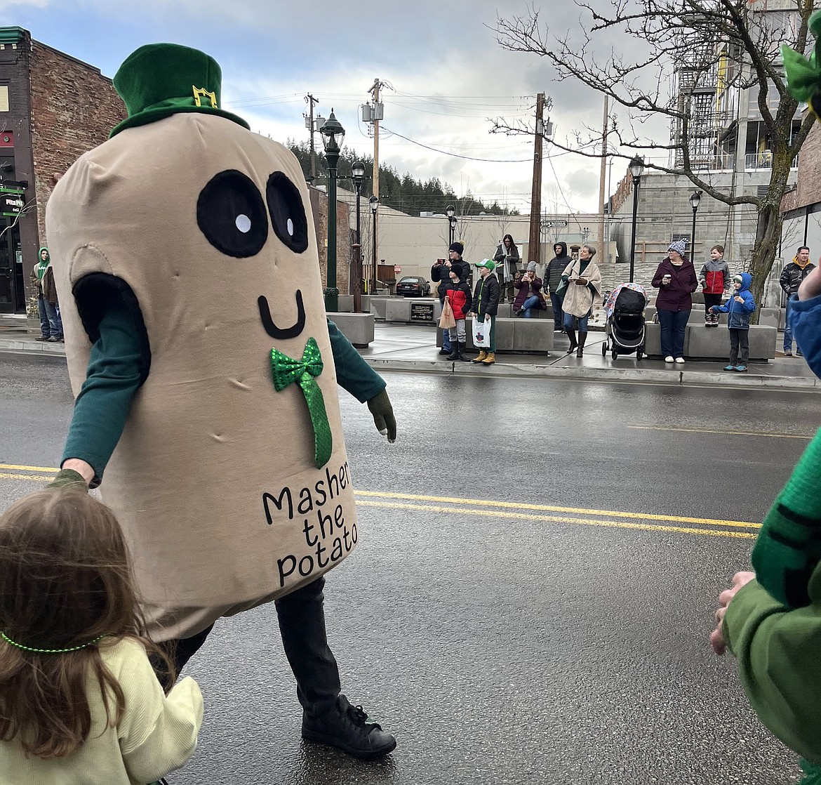 Masher the Potato greets the crowd during the St. Patrick's Day Parade.