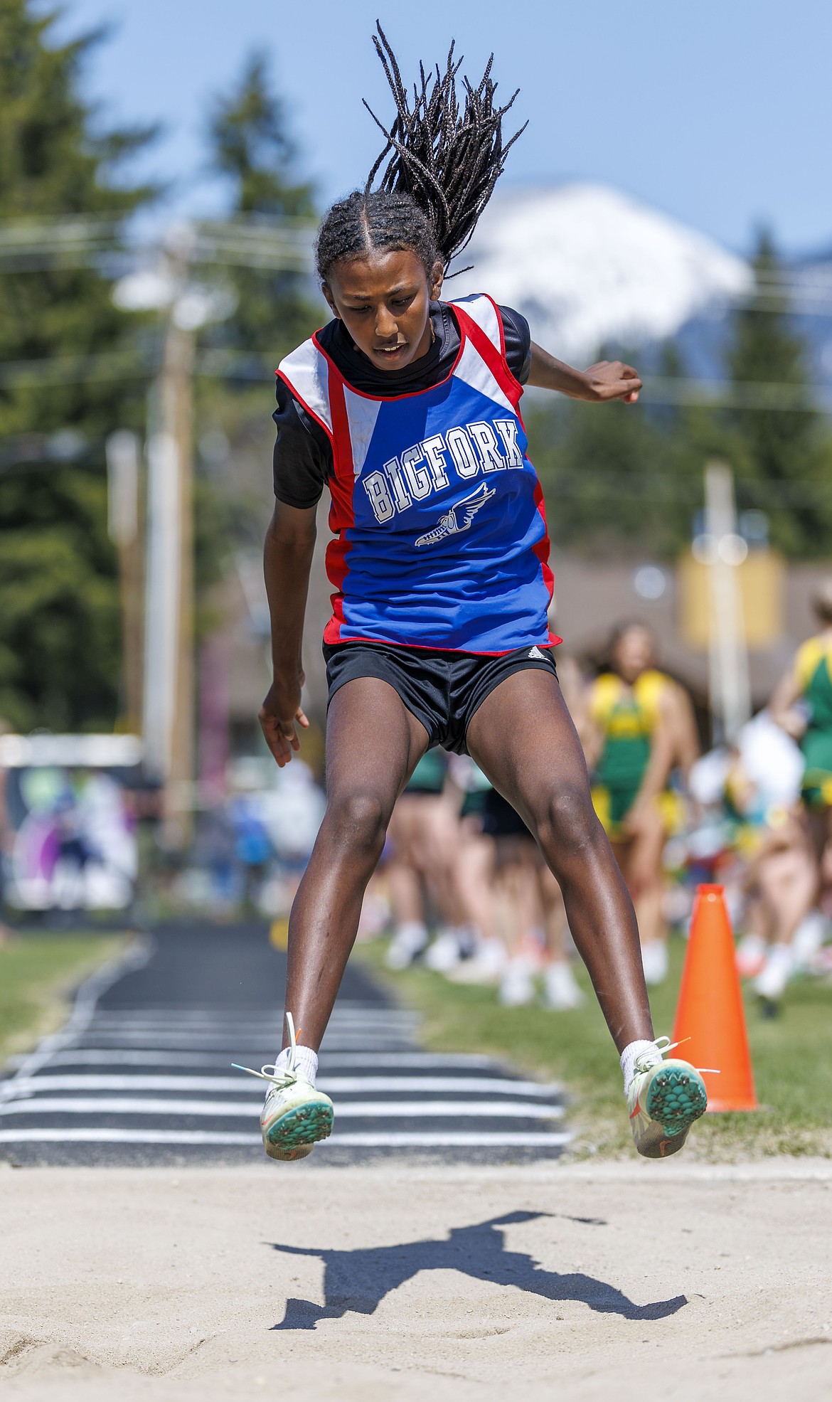 A great jump for Tsiyon Savik, a Bigfork middle school team mamber.