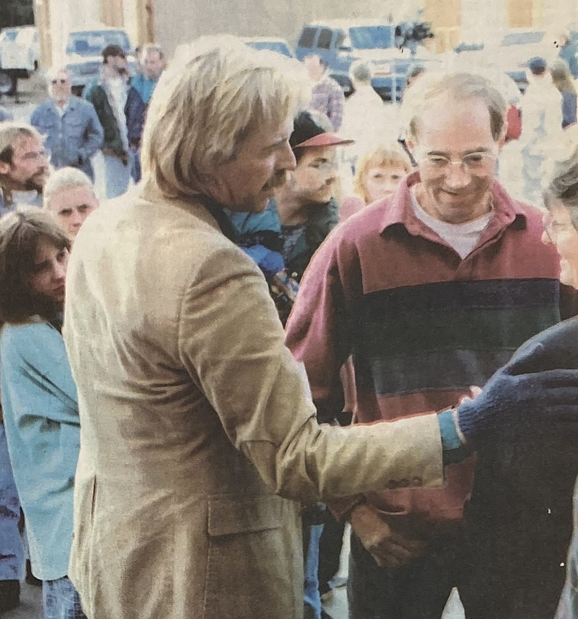 Woody McEvers, of the Rustler’s Roost on Sherman Avenue, greets customers in April 1995.