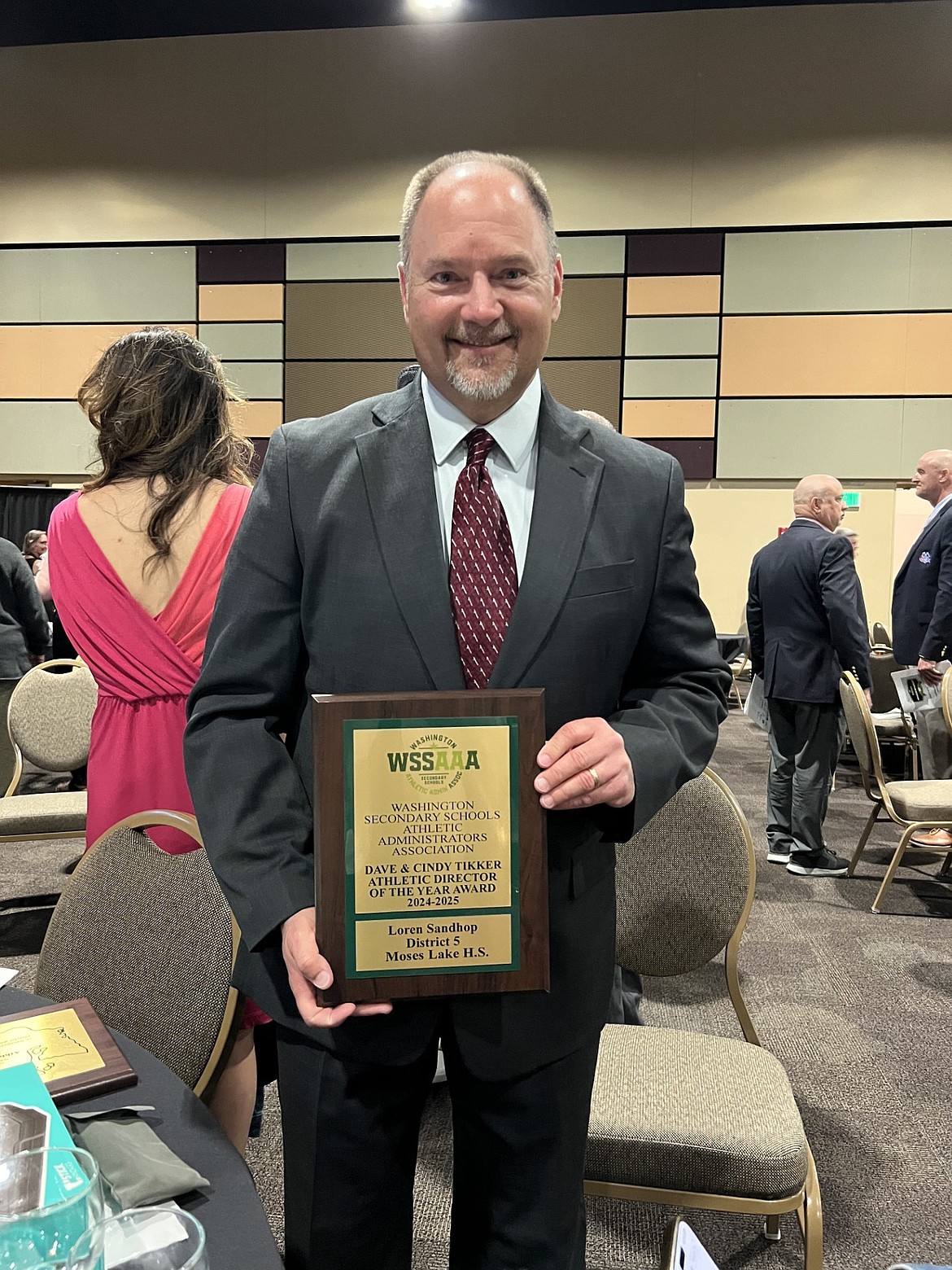 The Washington Secondary School Athletic Administrators Association gave Loren Sandhop a plaque honoring him as Washington State’s 2024/25 Athletic Director of the year.