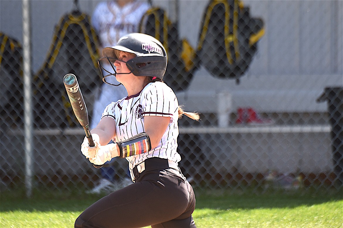 Troy's Leslie Gravier watches a ball she hit against Thompson Falls Saturday, May 3, 2025. (Scott Shindledecker/The Western News)