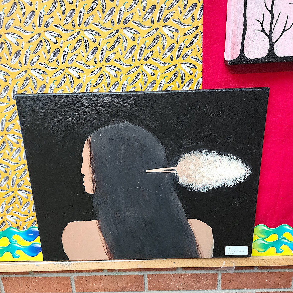 Student artist Bluesky FirstStrike had a 2-D painting in the Art Slam at Two Eagle River School. (Berl Tiskus/Leader)