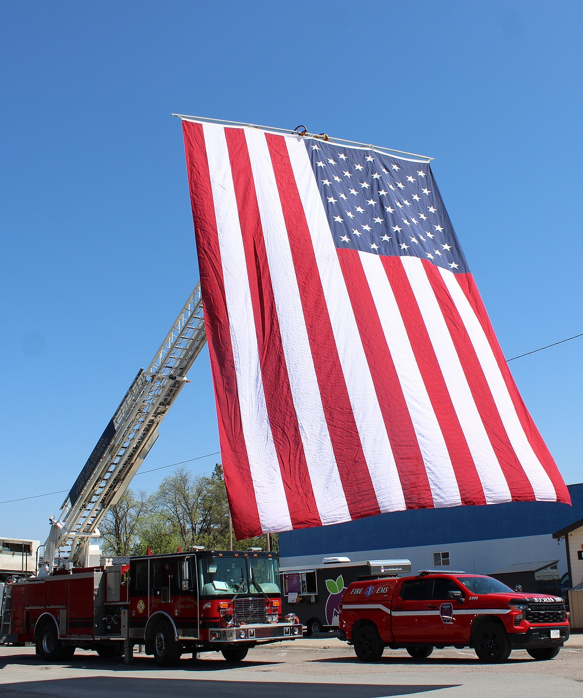 The Polson Fire Department hoisted the American flag during City Hall's Open House. (Kaleb Unger/Leader)