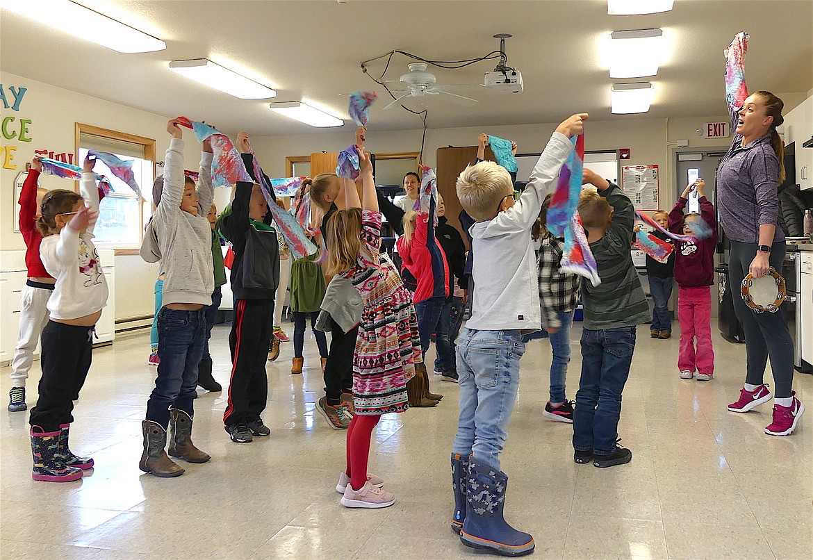 A dancer from Repertory Dance Theatre leads Dayton School students in an outreach program during the company's visit in 2019. (Mission Valley Live photo)