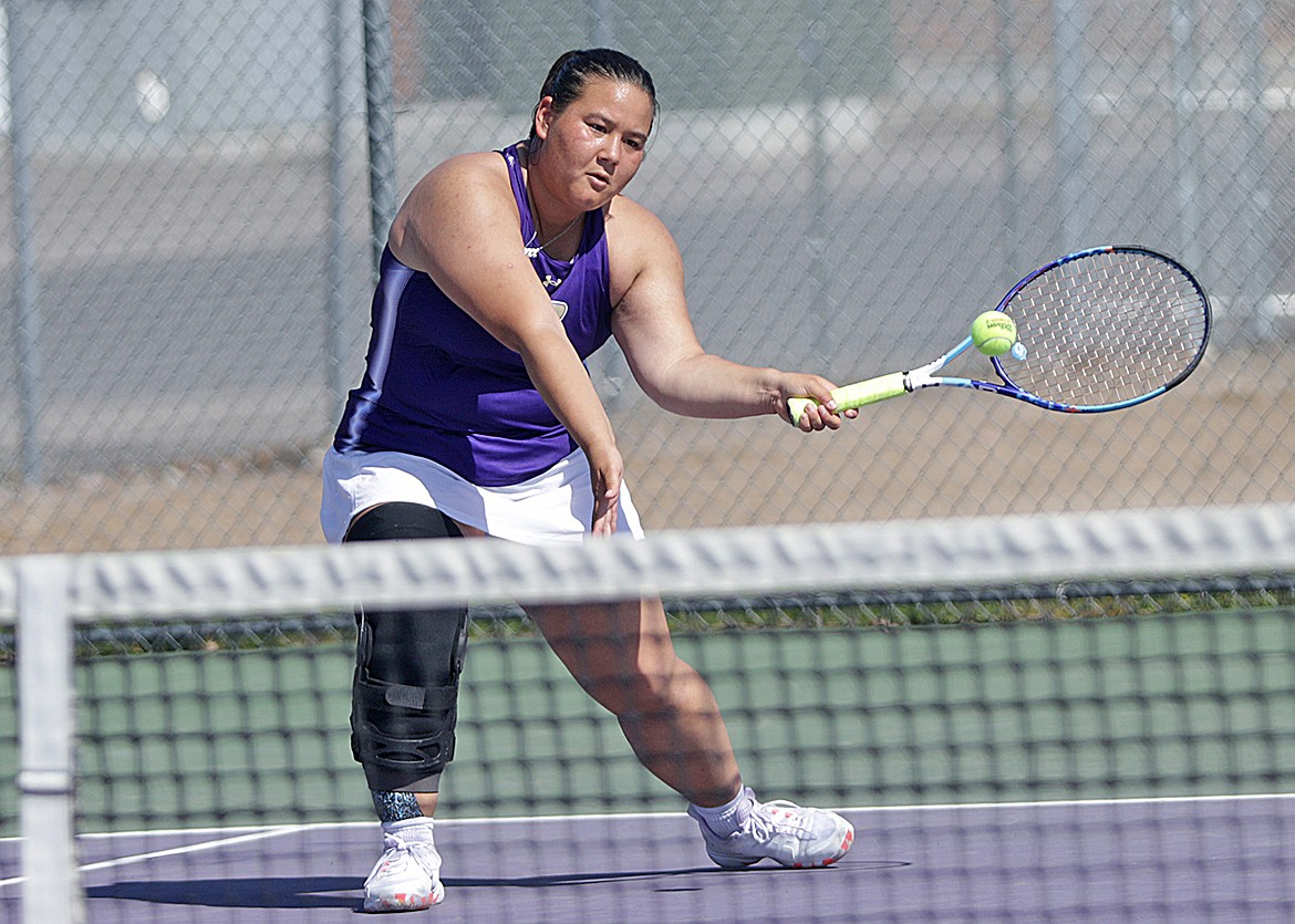 Polson's Summer Newman swats the ball during a number 1 battle against Bigfork. (Bob Gunderson photo)