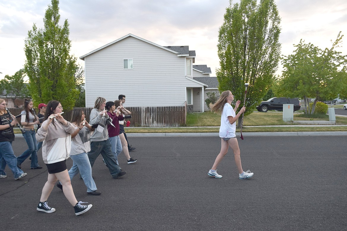 The Moses Lake High School Marching Band practiced their music and marching throughout residential neighborhoods behind Moses Lake High School Wednesday.