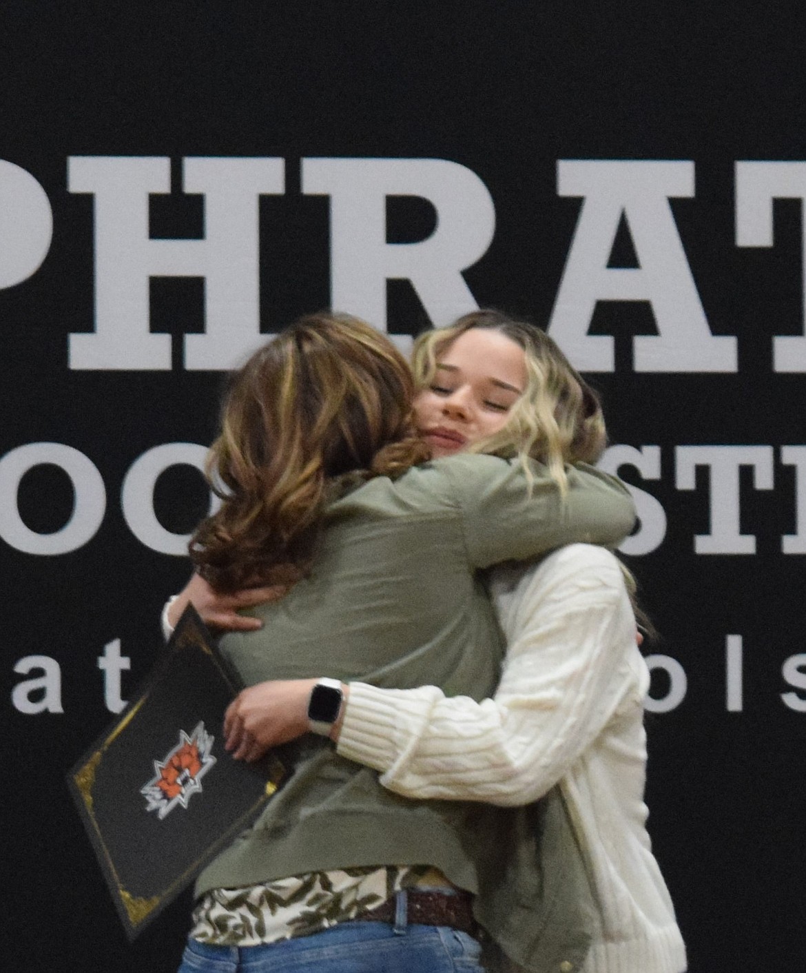 Teacher Heidi Burns from the Learning Center awarded Analise Marquez with the Grit Award from the Learning Center.