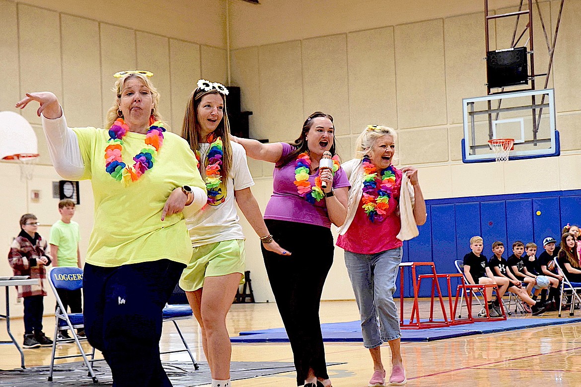 Libby Elementary School teachers Dimitria Trotter, Jennifer Goucher, Jenece Scheer and Cindy Curtiss wowed their students and fellow educators with a dance to accompany "Walking on Sunshine," released by Katrina and the Waves in 1983. The performance was part of the Spirit Assembly on Friday, May 9, 2025. (Scott Shindledecker/The Western News)
