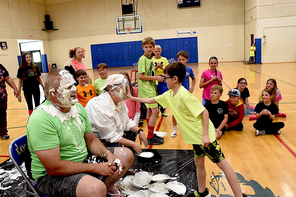 Libby Elementary School student Atlas Goucher didn't miss when he planted a cream pie in the face of School Principal Jeanine Kidwell Friday, May 9, 2025, during the Spirit Assembly. (Scott Shindledecker/The Western News)