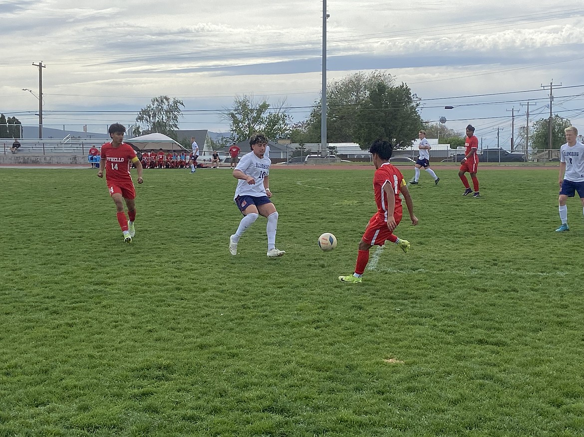 Luis Farias Villanueva and Larry Maldonado pair up to keep control of the ball. Head coach Bernie Garza said Villanueva was on top of his game locking down his opponents.