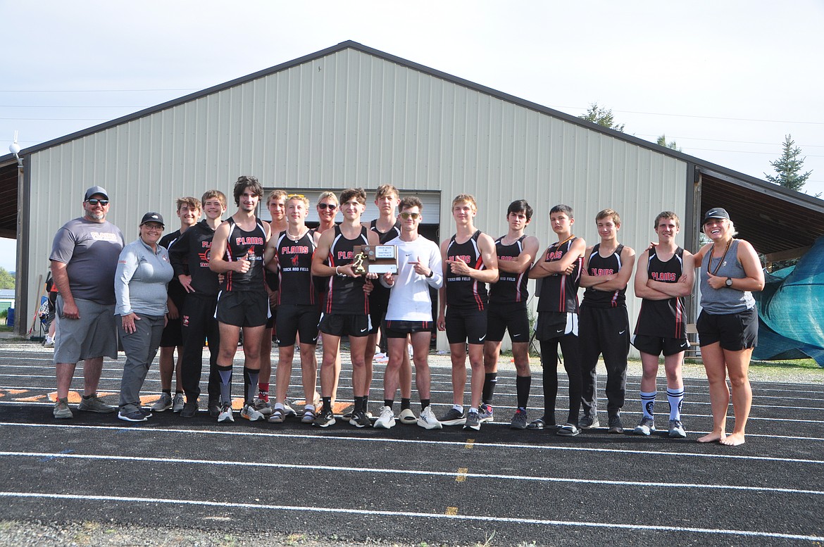 The Plains boys pose with their championship hardware following this past weekend's District 7B meet in Eureka.  (Photo by Sarah Naegeli)
