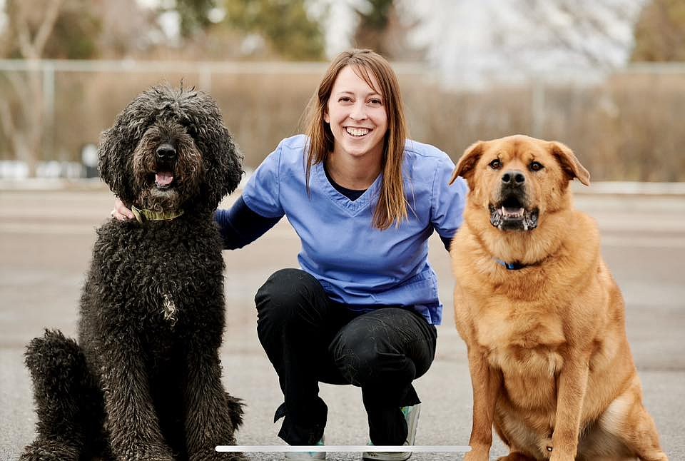 Melanie McInroe, with her pups Buck and Bourbon, is the owner of Mel's Mobile Pet Care Clinic. She will be providing pet care services at the St. Regis Senior Center on the first Friday of each month this summer. (Photo courtesy/Melanie McInroe)