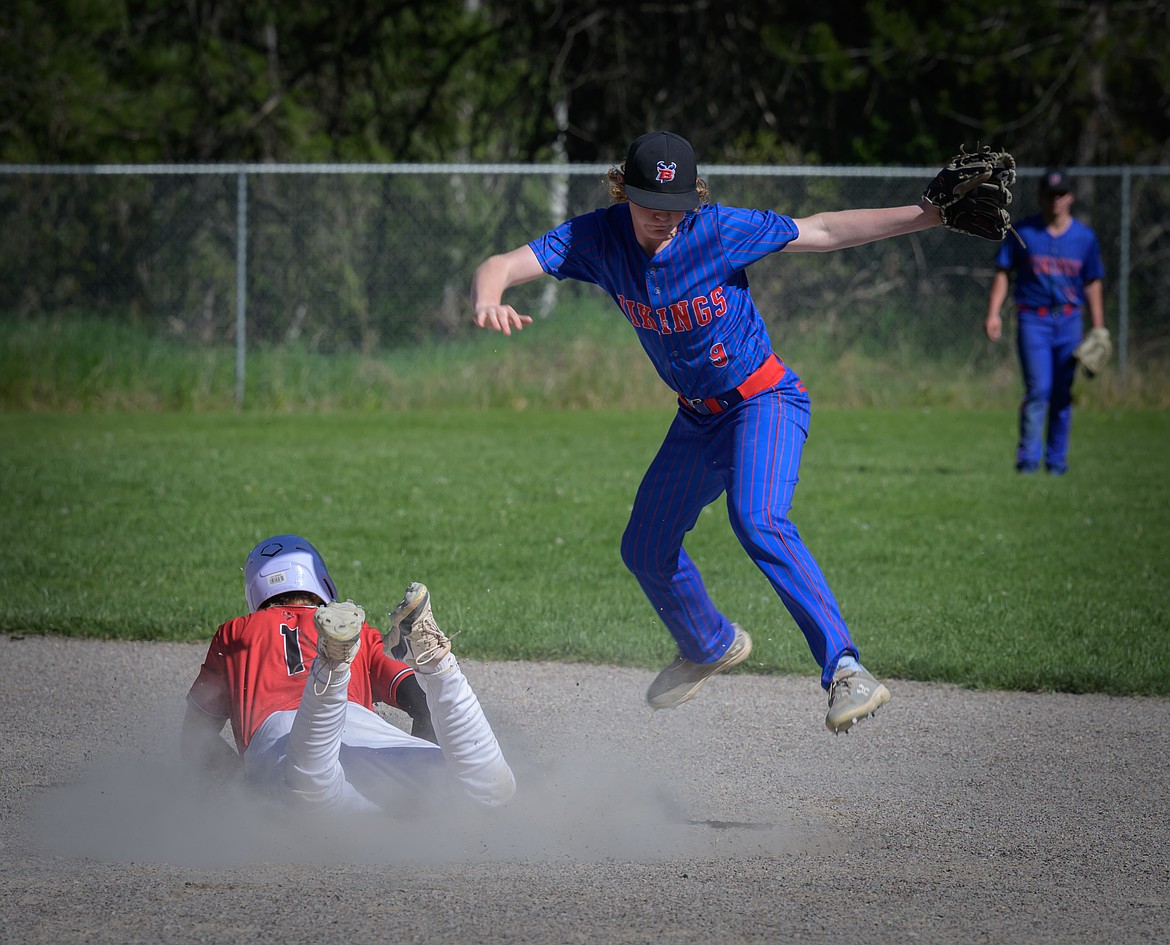 Noxon-Thompson Falls senior Bryson McCormick slides safely into second base during the Red Devils 5-4 win over Bigfork this past week in Noxon. (Tracy Scott, Valley Press)