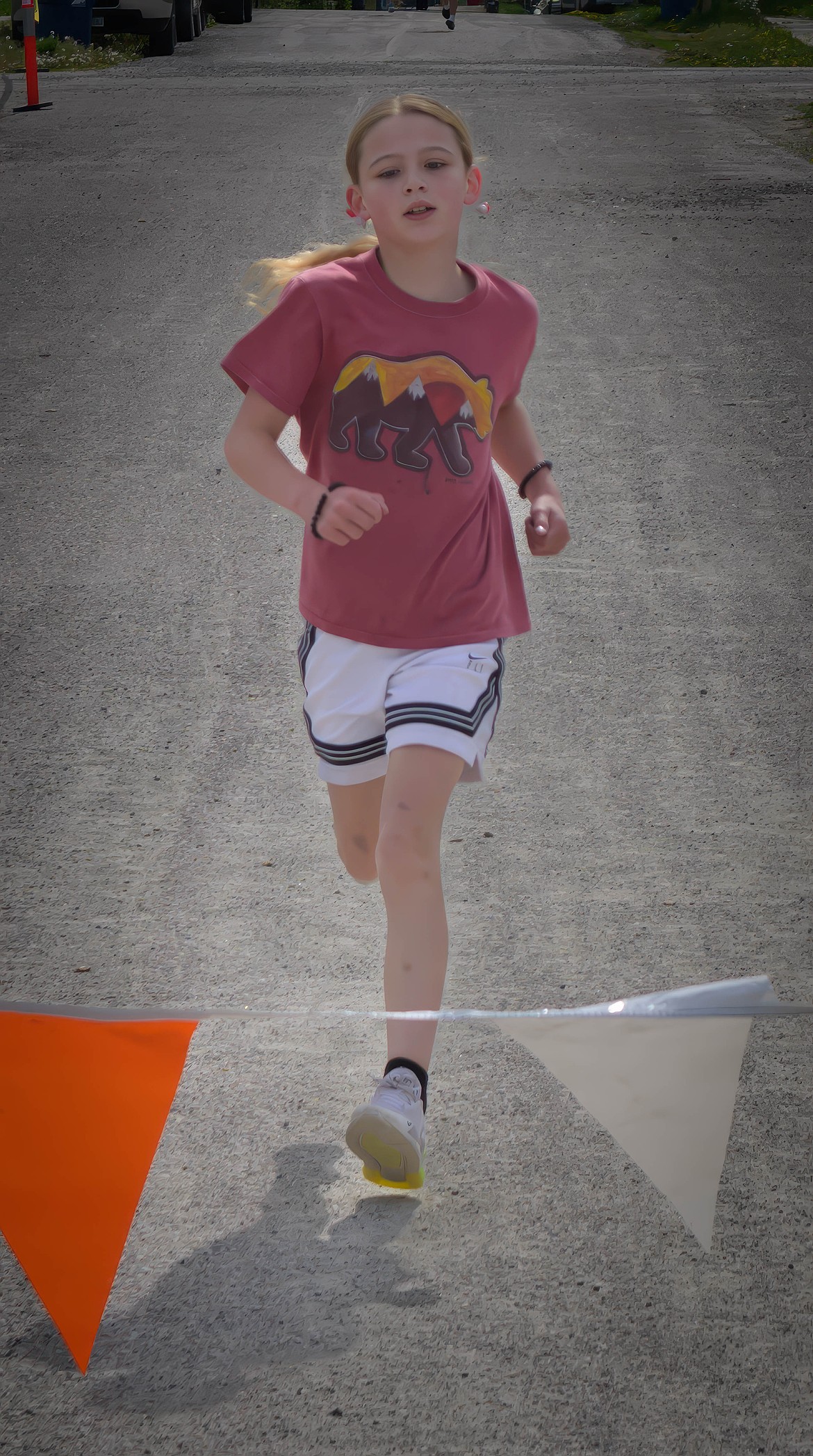 9-year-old Hadassah Ostler won the Bison Stampede Run Run. (Tracy Scott/Valley Press)