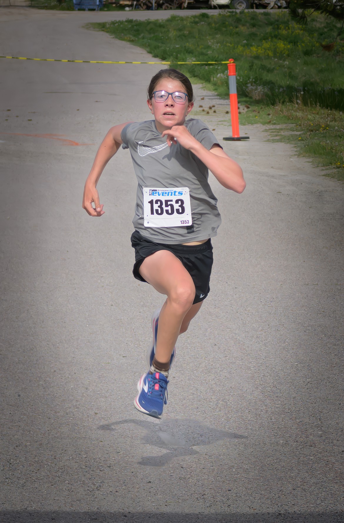 Ava Maanen races to first place in the Bison Stampede 5K race.