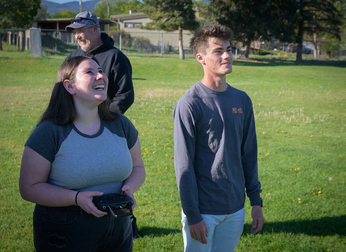 High School Senior Lily Cheuvront at the controls of an RC plane with Mike Reistroffer as flight support. (Tracy Scott/Valley Press)