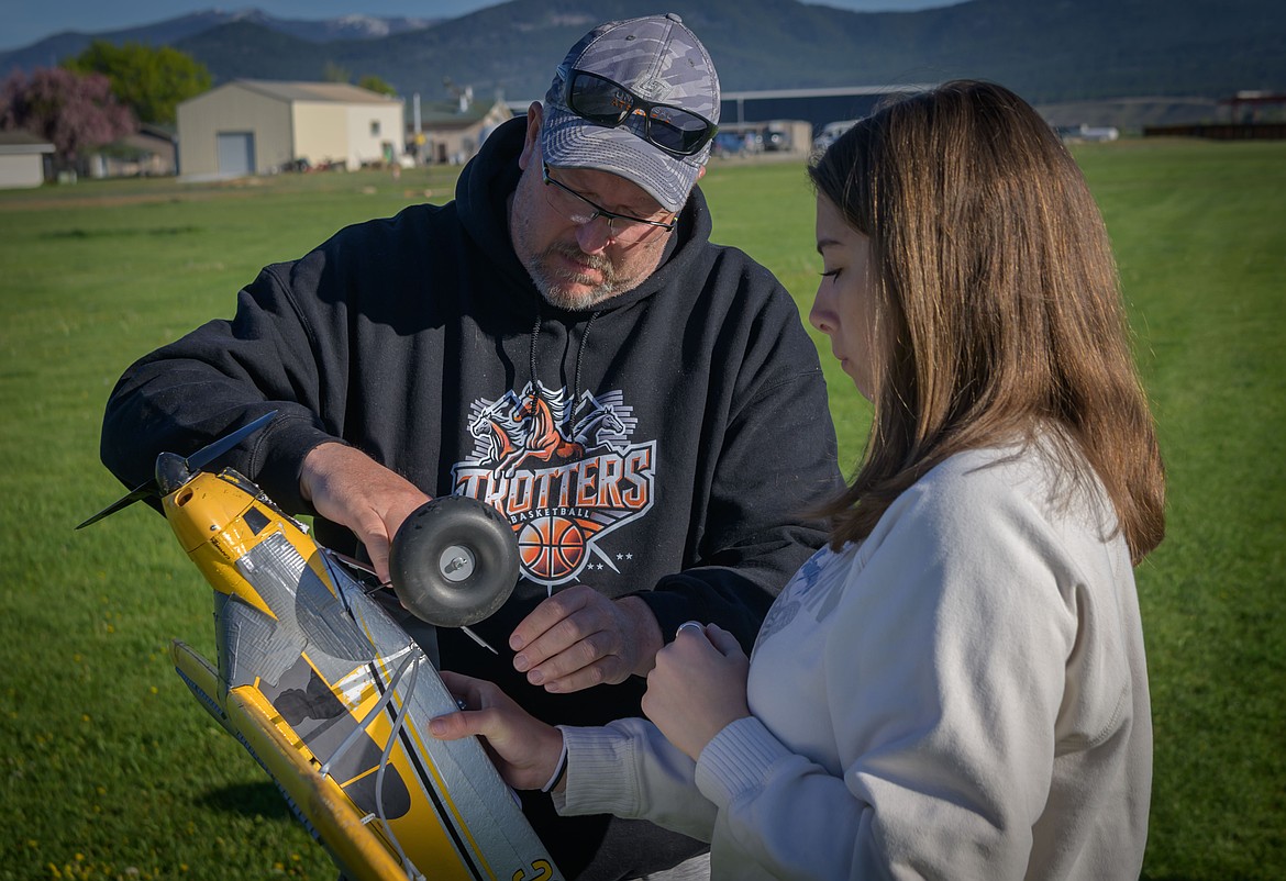Plains Science teacher Brooks Sanford during a teaching moment with senior Trystan Larsen. (Tracy Scott/Valley Press)