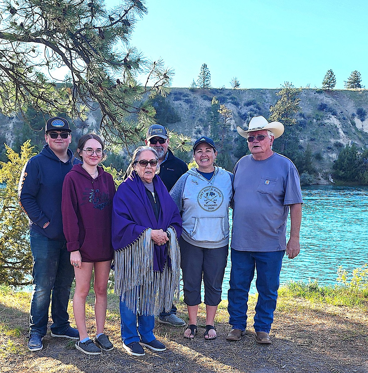 Tyler Gillin,left, sister Kelsey Gillin, stand with their grandmother Violet Trahan. In the back row are Ross Gillin, son-in-law, Stephanie Gillin, daughter, and Trahan's husband of 54 years, Ron. (Berl Tiskus/Leader)