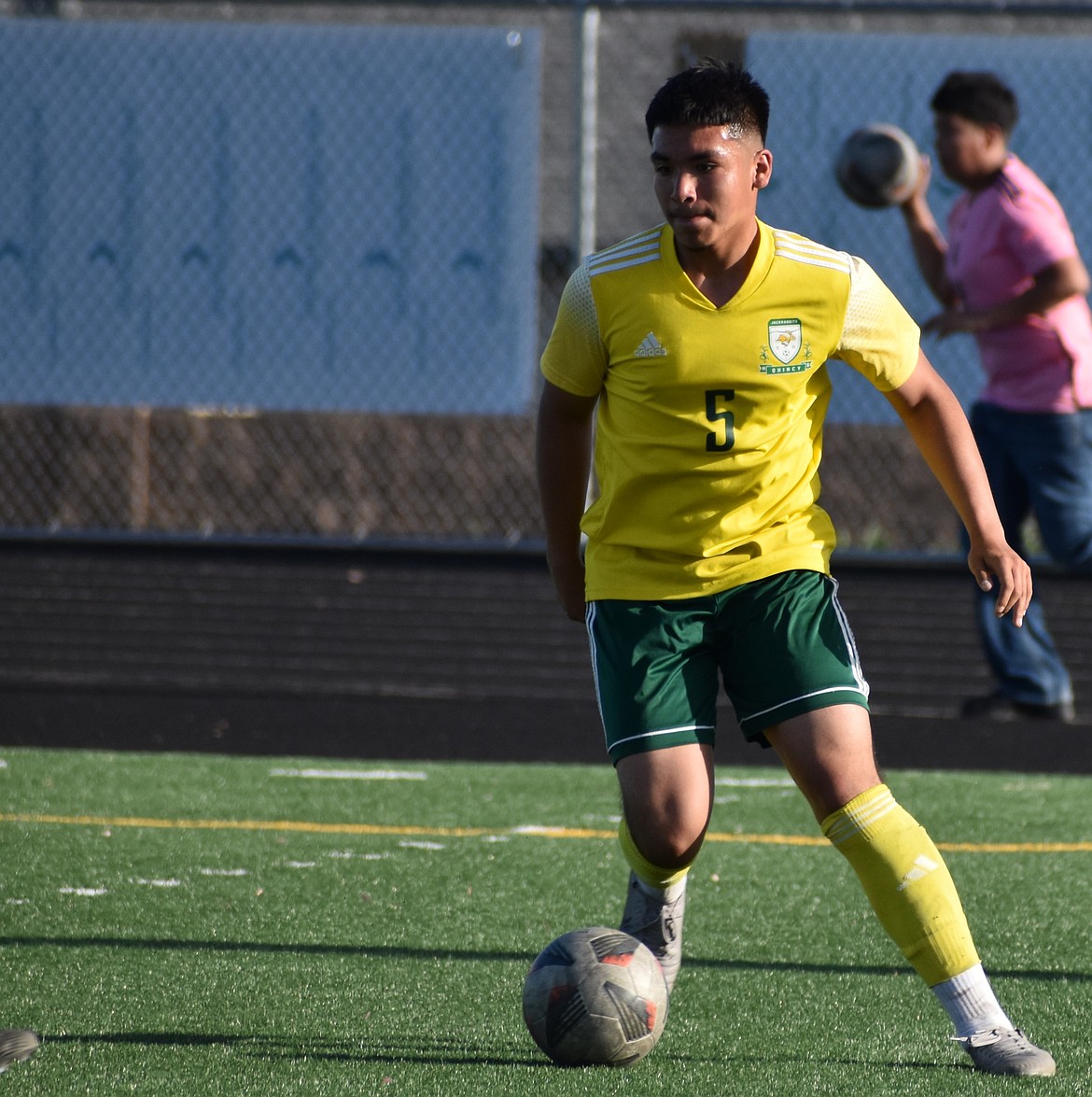 Maximo Serrano from a previous home game prepares to use his footwork to outmaneuver his opponent. The Jacks had every member of the team participate in their win against Ellensburg.