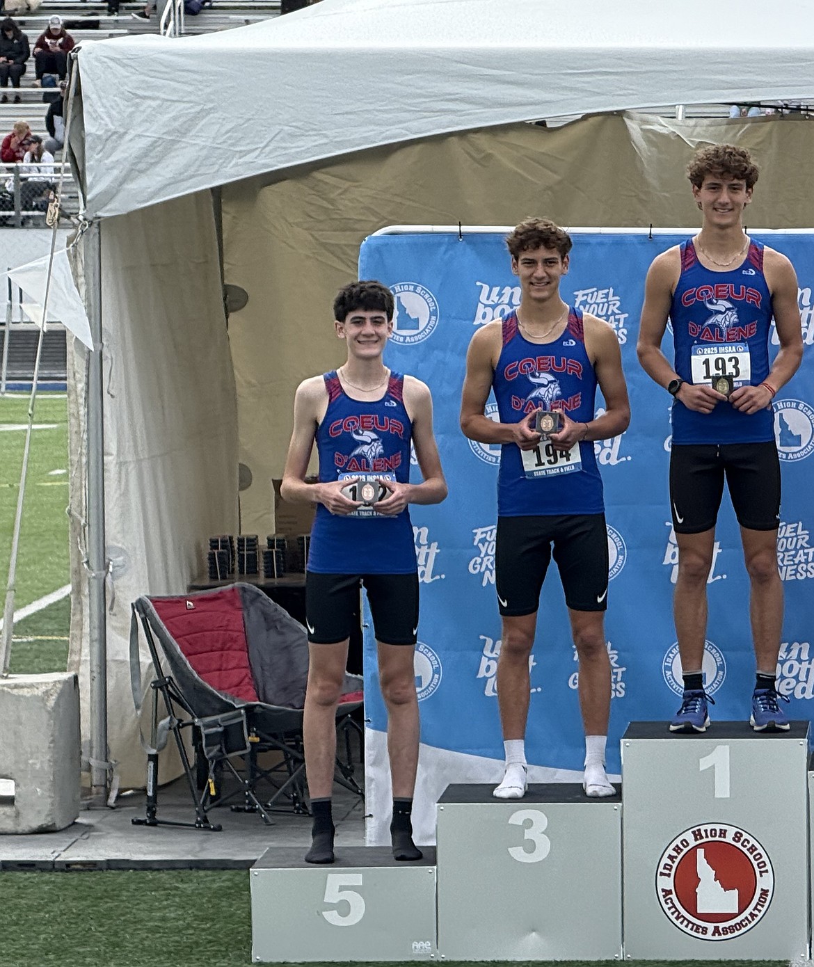 Courtesy photo
From left, Coeur d'Alene's Wyatt Carr, Zack Cervi-Skinner and Max Cervi-Skinner pose with their medals after the state 6A boys 3,200-meter run at Mountain View High in Meridian on Friday.