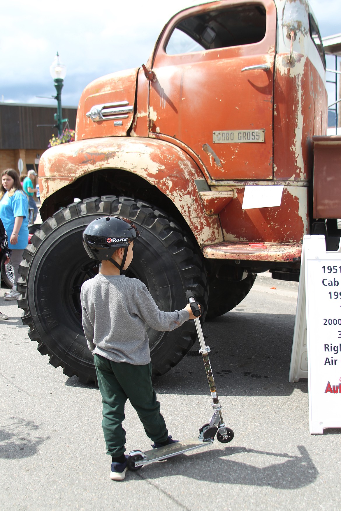 Theo Britton checks out one of the vehicles on display at Saturday's Lost in the '50s car show in downtown Sandpoint. The youth is the son of Natalie and Tyler Britton of Sandpoint.