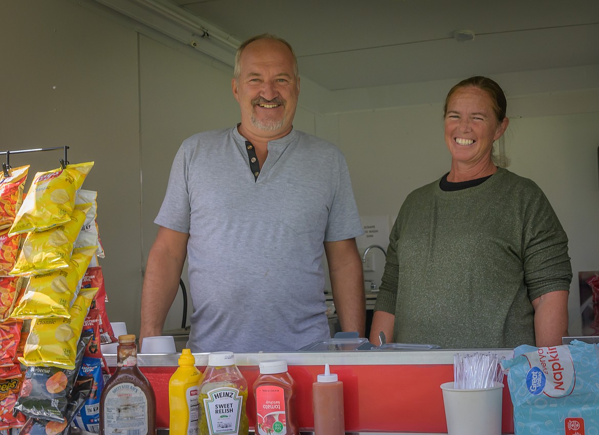 Henry and Laura Raber owners of 406 Chuck Wagon volunteering their cooking skills and portable kitchen during Plains Beautification Days. (Tracy Scott/Valley Press)