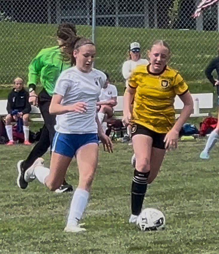Photo by JULIE SPEELMAN
Kenzie Rix, right, of the Sting Girls 11 soccer team plays the ball in a game against the Big Sky Futbol Club in the recent Bill Eisenwinter Hot Shot Tournament.