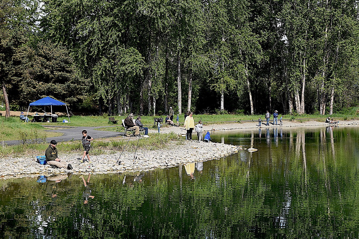 Area anglers of various ages enjoyed a sunny day Saturday, May 17, 2025, at the Rotary Club of Kootenai Valley annual event at the Youth Fishing Pond in Libby. (Scott Shindledecker/The Western News)
