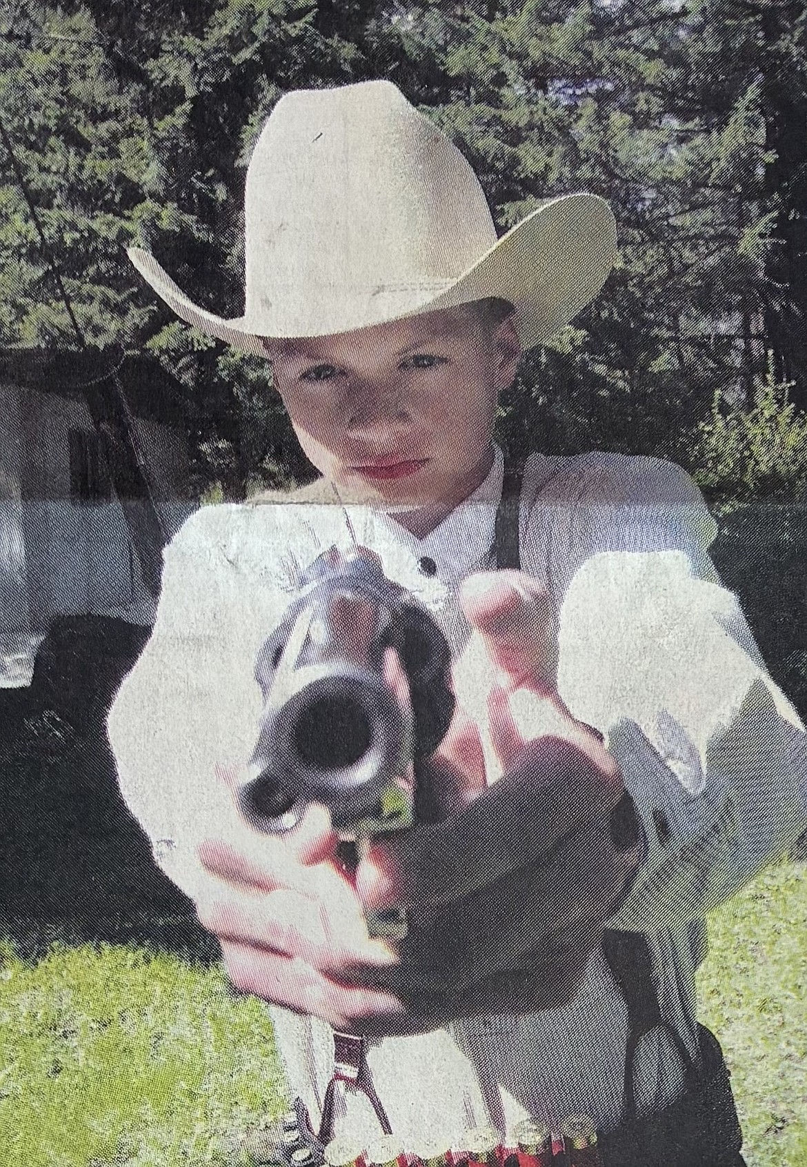 Adam Piper (aka “Li’l Bud the Kid”) aims his .357 magnum in May 2000.