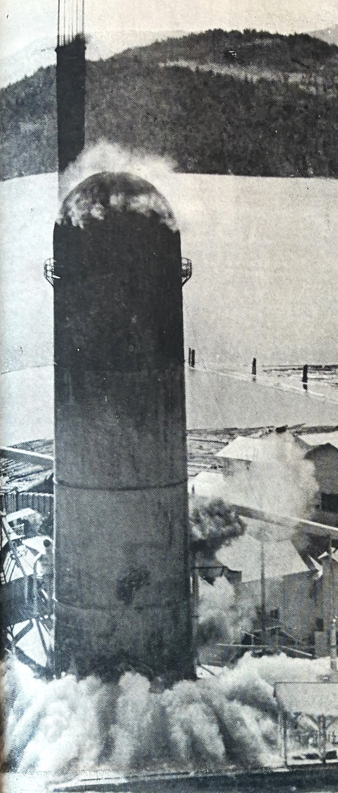 After 128 sticks of dynamite explode, dust billows from the old Rutledge mill sawdust and bark burner as it begins to tumble May 24, 1970.