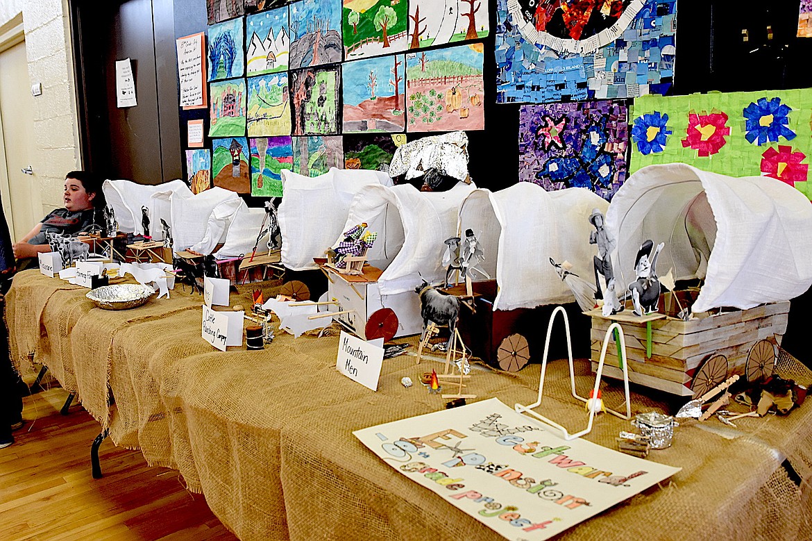 Troy eighth-grade students got together to create a display of westward expansion at the school's annual student art show Tuesday, May 20, 2025. (Scott Shindledecker/The Western News)