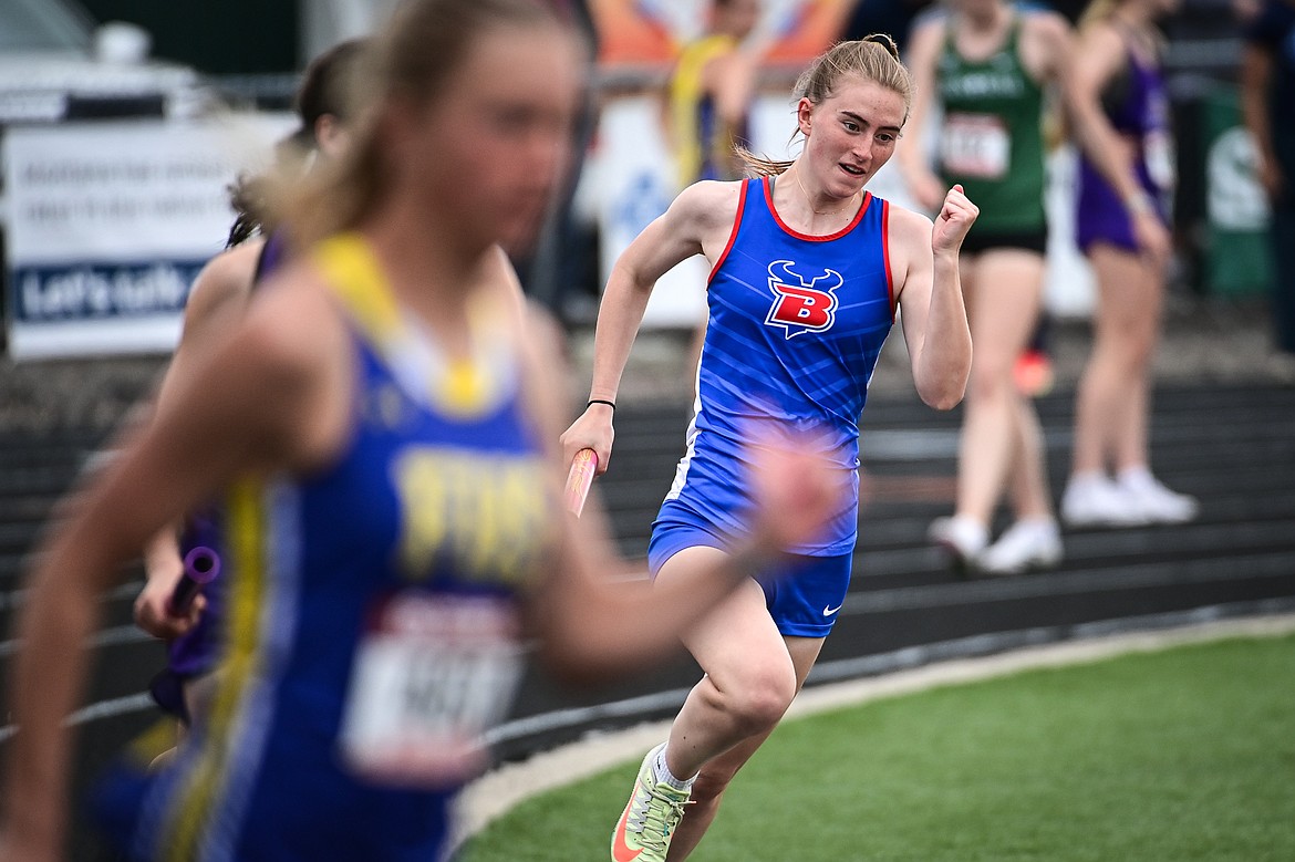 Bigfork's Peyton Benson runs in the girls' 4x100 meter relay trials at the Class A state track and field meet at Legends Stadium on Friday, May 23. (Casey Kreider/Daily Inter Lake)