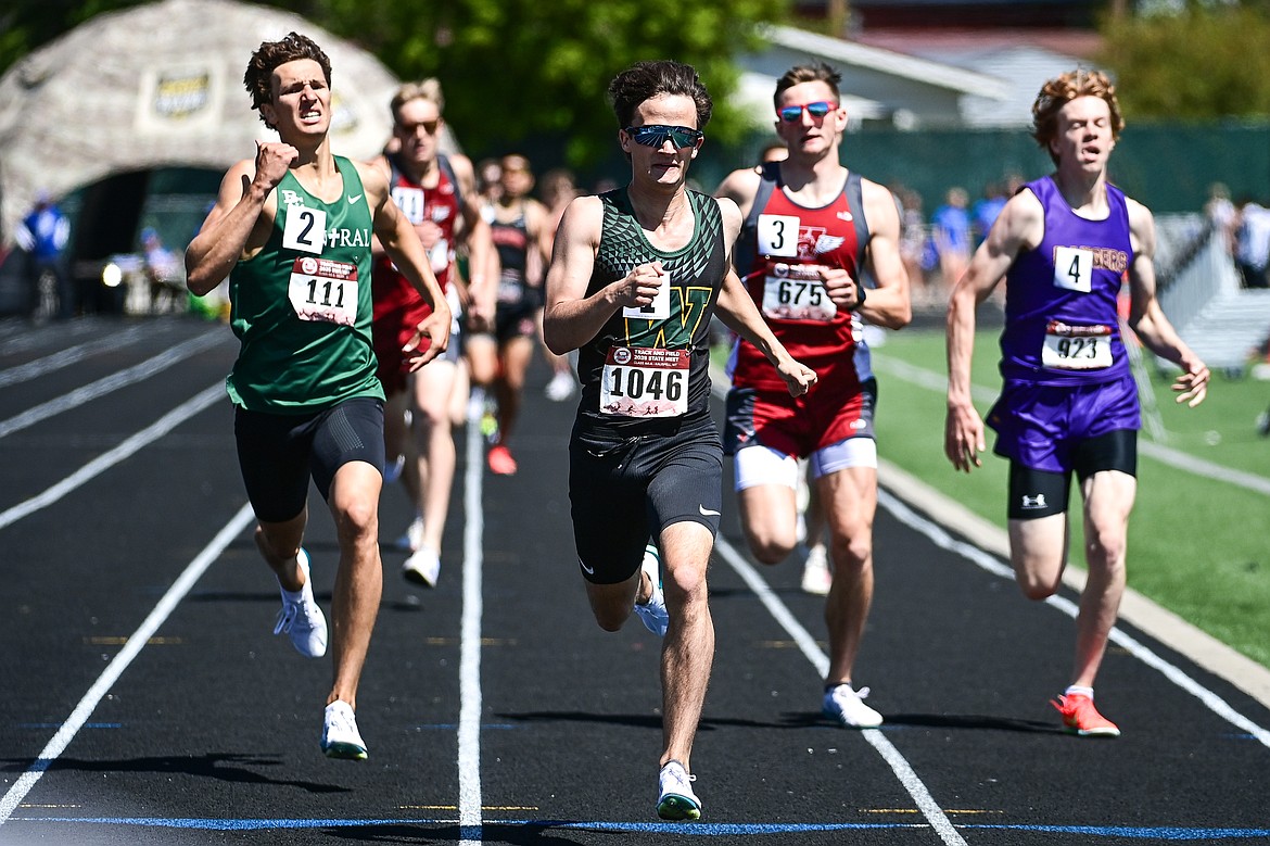 Whitefish's Simon Douglas celebrates as he crosses the finish line for a first-place finish in the boys 800 meter run at the Class A state track and field meet at Legends Stadium on Saturday, May 24. (Casey Kreider/Daily Inter Lake)