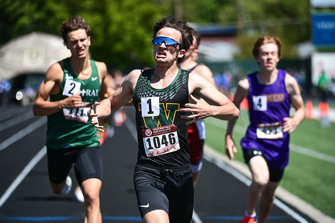 Whitefish's Simon Douglas celebrates as he crosses the finish line for a first-place finish in the boys 800 meter run at the Class A state track and field meet at Legends Stadium on Saturday, May 24. (Casey Kreider/Daily Inter Lake)