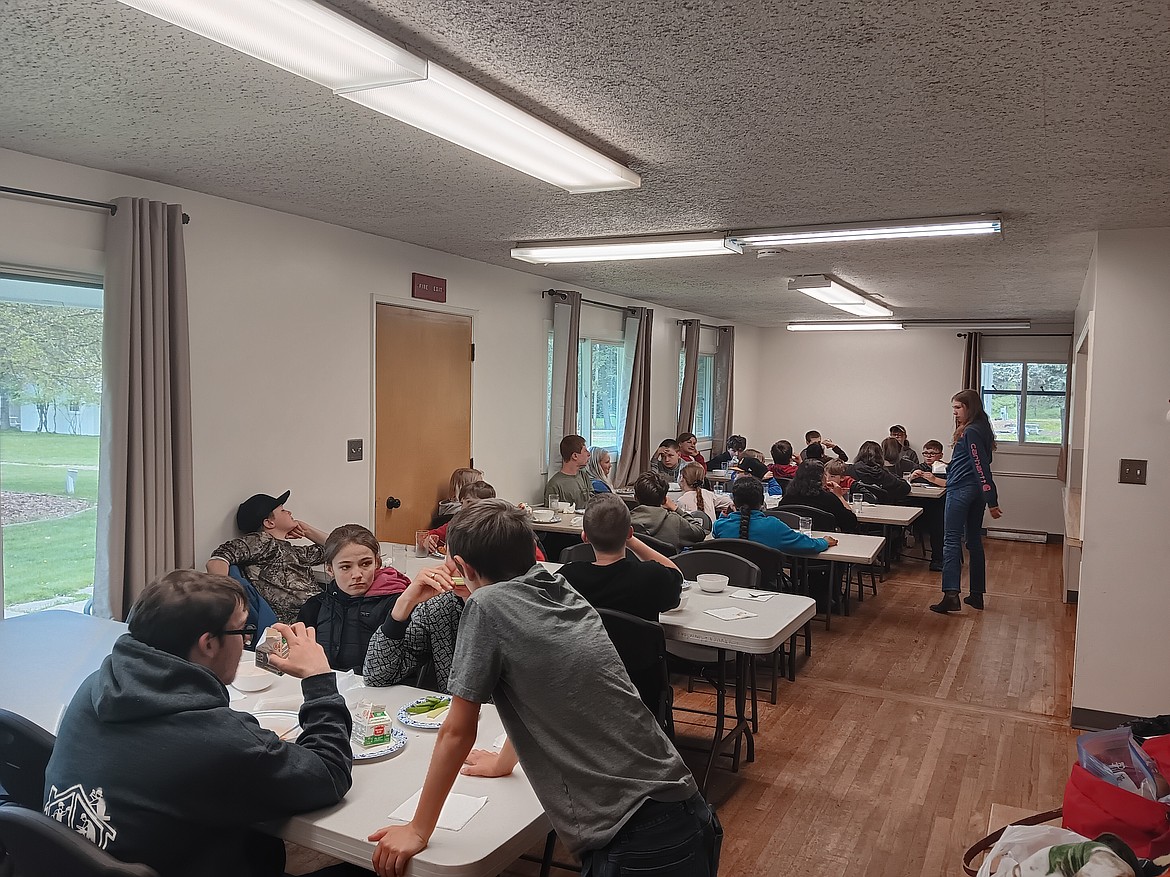 The chow hall served three meals each day to the students who divvied up the KP duties. Roni Phillips was the Kitchen Manager, but staff and counselors were all helpful peppering and serving the food. (Monte Turner/Mineral Independent)