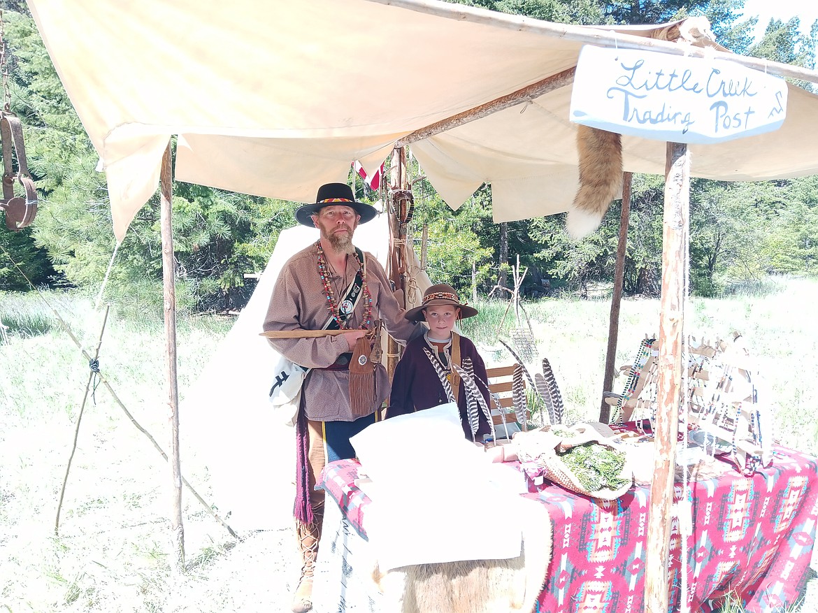 Father and son Matt and Alexander Deen run their trading post at the Wild Horse Rendezvous. All items were locally produced and are used in reenactments all over the country. (Monte Turner/Mineral Independent)
