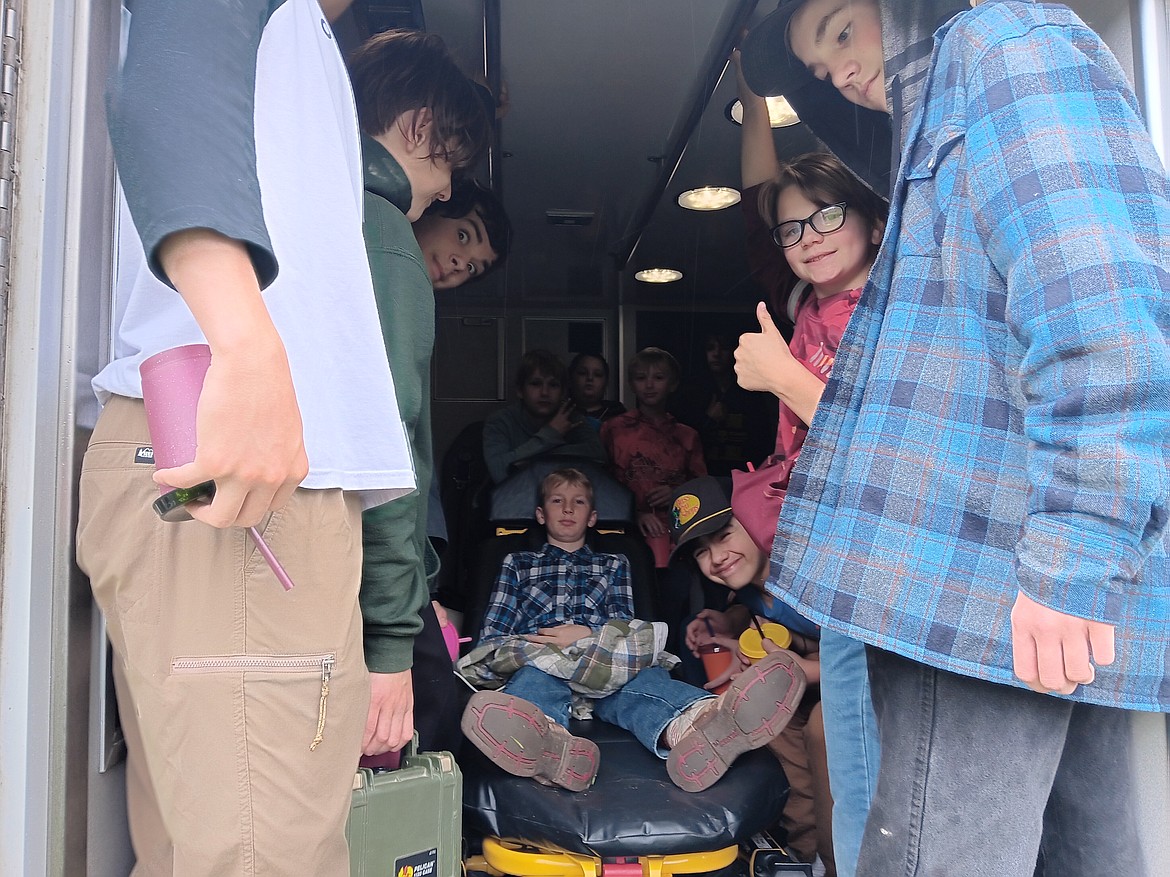 How many kids can fit into one of the Superior Area Ambulances was tested as students felt what tight working conditions were like when caring for injured patients enroute to emergency rooms. What medicines, equipment and communication they have when going over 60mph and seconds count. (Monte Turner/Mineral Independent)