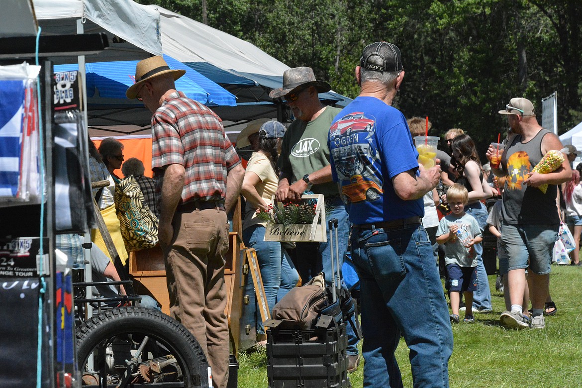 The annual flea market in St. Regis saw some of the nicest weather in recent years, with highs in the mid-70s and 80s on Saturday and Sunday, leading to very long lines at the always popular lemonade stand. (Mineral Independent/Amy Quinlivan)