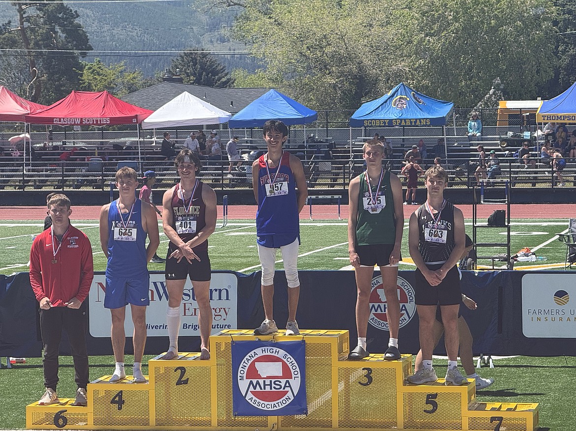 Superior senior Trizten Avila poses on the medal stand with his medal for winning the 100-meter dash during this weekend's State B track and field championships in Missoula. Avila set a new state class B record in the 200-meter event to go with his victory Friday in the 400-meter run. (Superior staff courtesy photo)