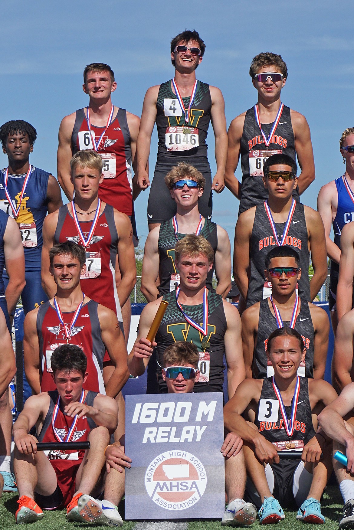 Ethan Amick, Simon Douglas, Colby Minton and Preston McPherson finish first in the Men's 4X400 Relay. (Matt Weller photo) .